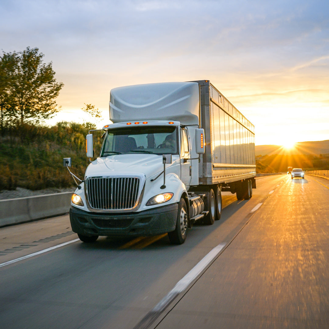Cobra tech panel image truck on sunny road