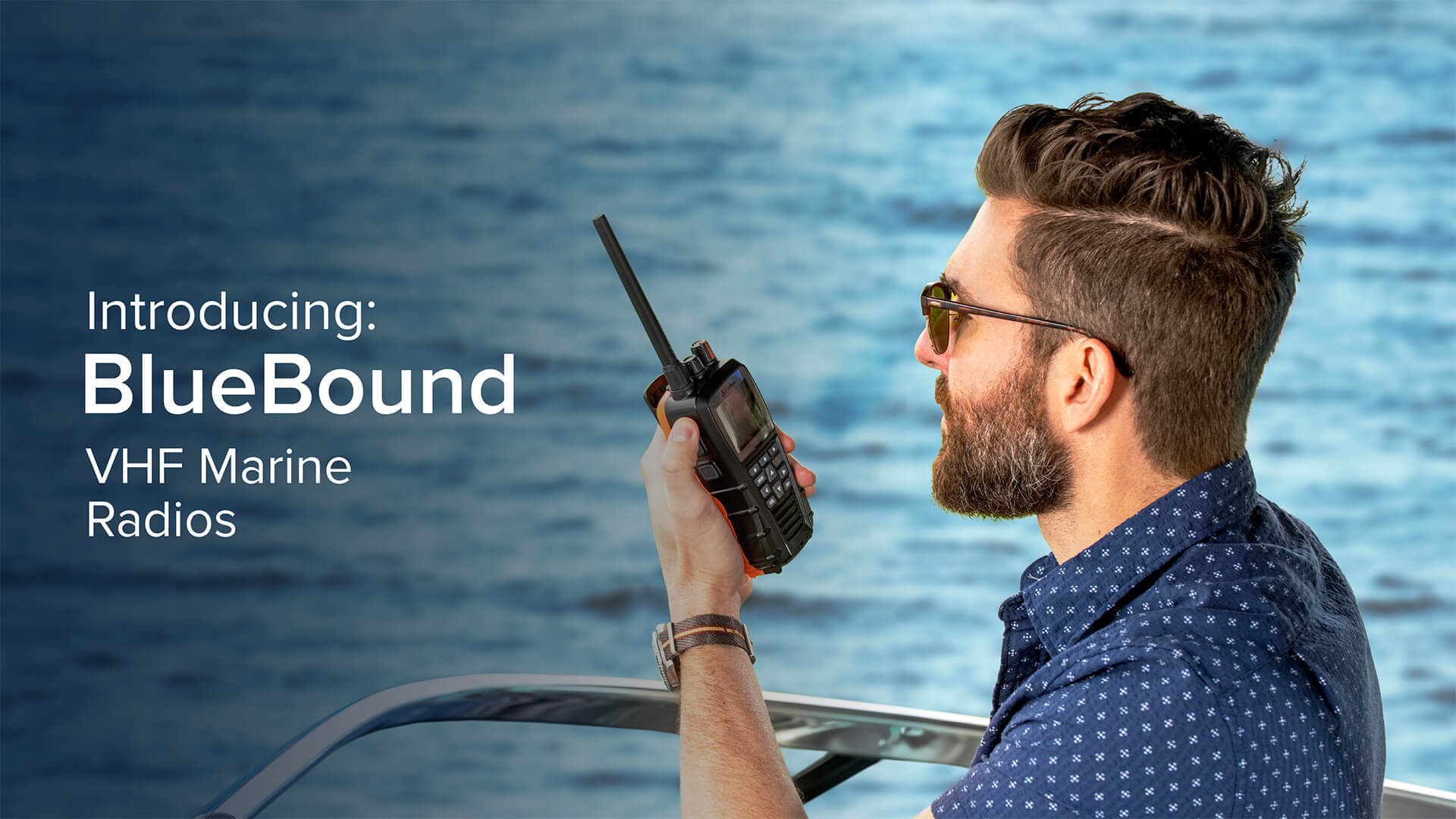 Man on a boat holding a Cobra Bluebound 650 marine radio. Text reads "Introducing: BlueBound VHF Marine Radios"