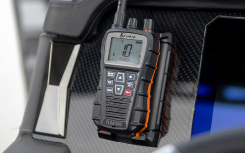 Cobra BlueBound handheld floating radio mounted to a dashboard