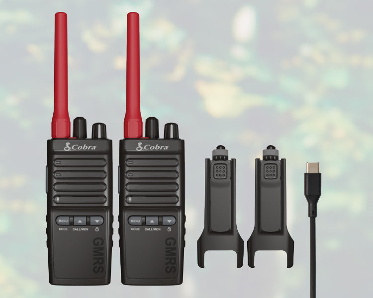 Contents of Cobra Trailblazer 500 GMRS radio retail box include 2 radios with included li-ion batteries, swivel holsters, and charge cable