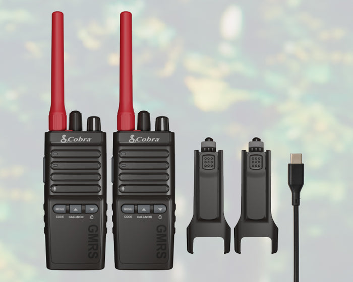Contents of Cobra Trailblazer 500 GMRS radio retail box include 2 radios with included li-ion batteries, swivel holsters, and charge cable